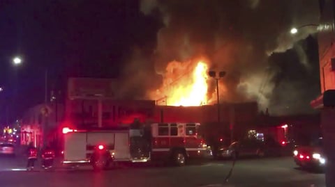 This photo taken from video provided by @OaklandFireLive shows the scene of a fire in Oakland, early Saturday, Dec. 3, 2016.
